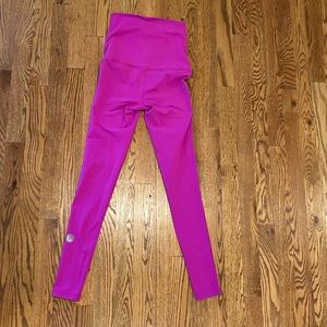 Pure Barre high waisted magenta leggings